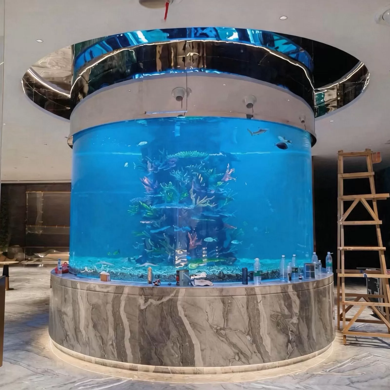 Customized large acrylic ornamental fish tanks with cylindrical marble bases